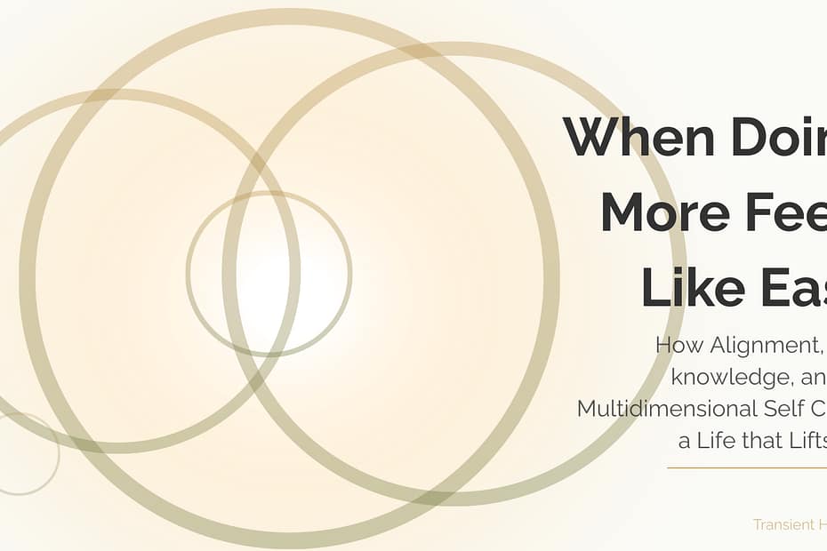When Doing More Feels Like Ease 4 Abstract design with overlapping translucent rings and a soft golden glow, symbolizing multidimensional self-awareness and inner alignment.